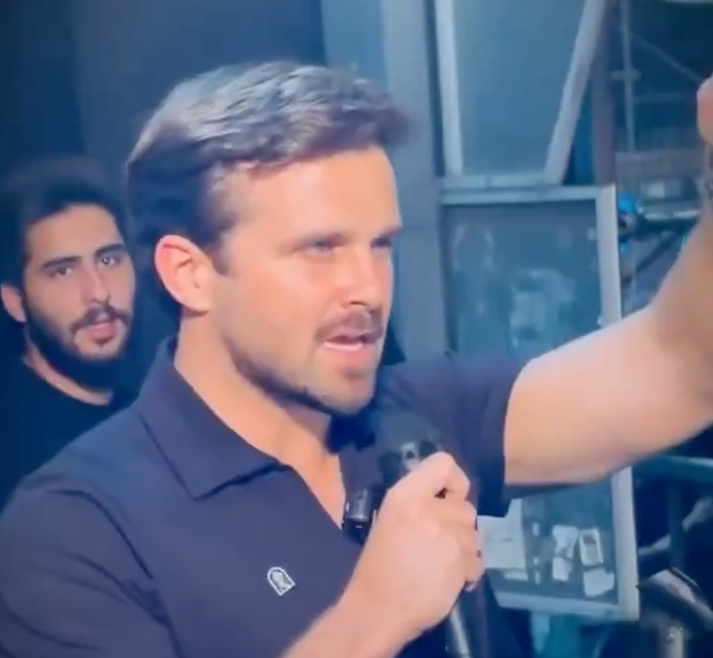 U.S. political influencer Jackson Hinkle chanting anti-American slogans at the funeral for Ayatollah Ali Khamenei in Tehran, Iran, on July 7