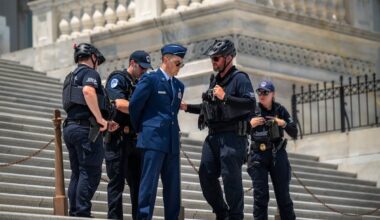 Air Force major arrested on Capitol steps during protest calling for Trump impeachment