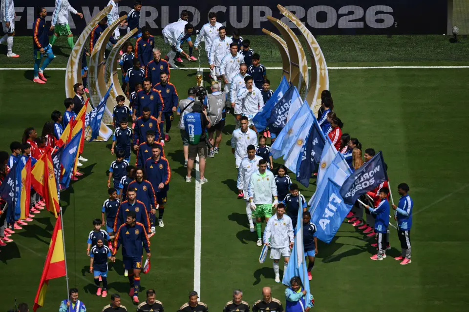 Spain and Argentina players walk onto the pitch before the 2026 World Cup final