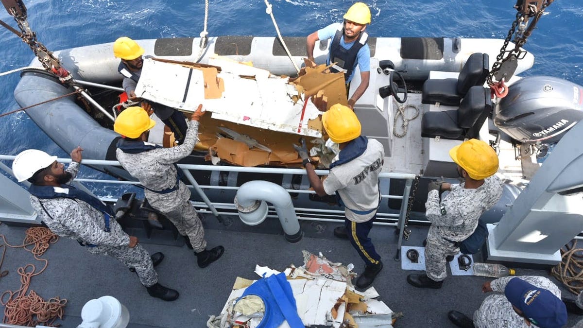 Rescuers searching for plane debris