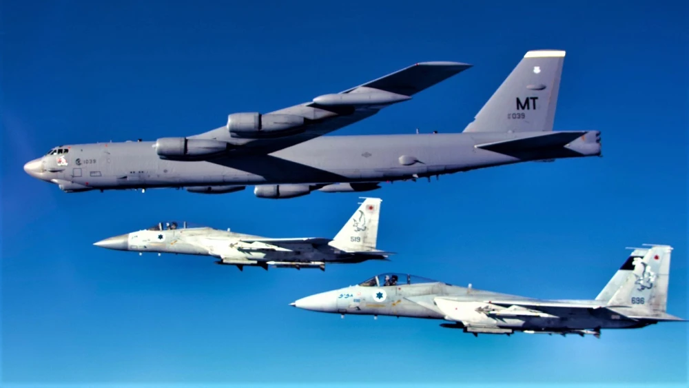 Israeli Air Force F-15s escort an American B-52 bomber through Israeli skies on Feb. 14, 2022.
