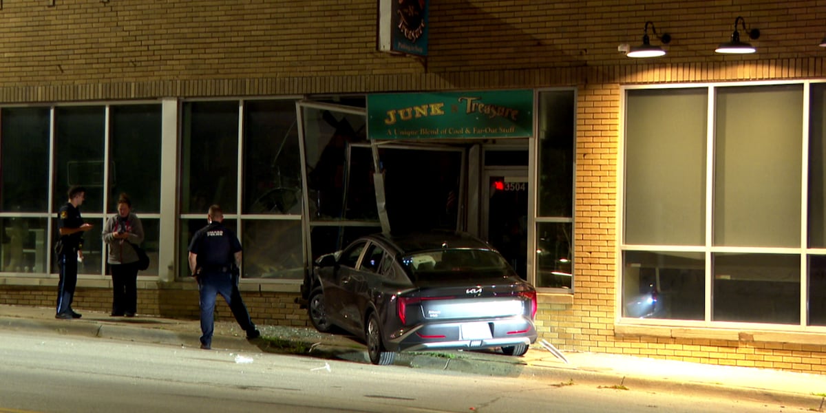 Car crashes into Omaha business, sends one to hospital