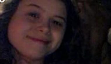 Woman swept in flash flooding found dead