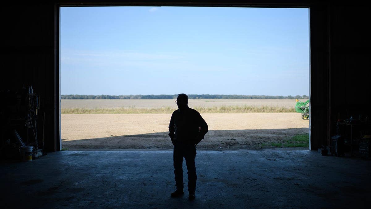 LG Raun stands outdoors in El Campo, Texas.