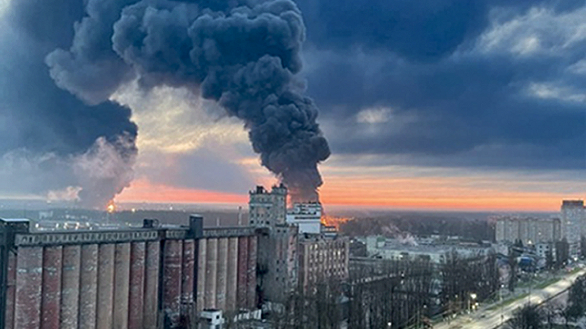 In this photo taken by an anonymous source, smoke rises from oil storage facilities hit by fire in Bryansk, Russia, on April 25.