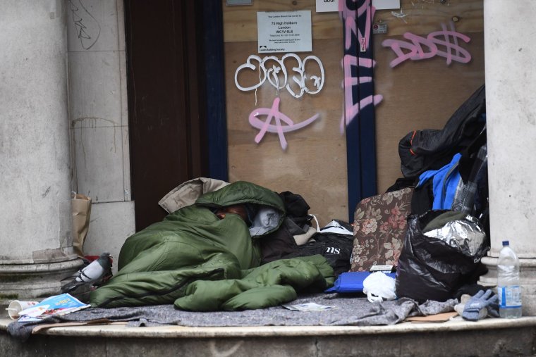 EMBARGOED TO 0930 WEDNESDAY DECEMBER 7 File photo dated 28/01/20 of a homeless man sleeping in the doorway of a closed down branch of the Leeds Building Society on Kingsway, Holborn, London. Homeless people in London are to be sheltered with temperatures set to plummet below freezing during ice-cold evenings. Issue date: Wednesday December 7, 2022. PA Photo. The capital's Severe Weather Emergency Protocol (SWEP) has been activated for the first time this winter to provide emergency accommodation for rough sleepers. See PA story WEATHER Homeless. Photo credit should read: Victoria Jones/PA Wire