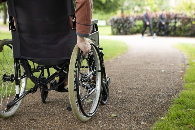 Contrast between a person with a physical disability and the physically active