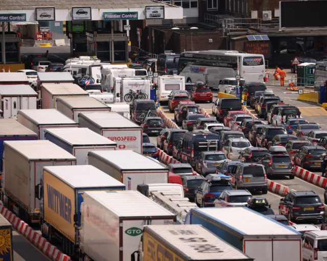 DOVER, ENGLAND - JULY 21: Queues of lorries and cars move steadily at the Port of Dover as the busy summer travel period begins on July 21, 2023 in Dover, England. State-educated children finish school today for the summer break and many families are heading abroad on holiday. Since the UK left the European Union, post-Brexit passport checks have led to queues of traffic at the Port of Dover. (Photo by Dan Kitwood/Getty Images)