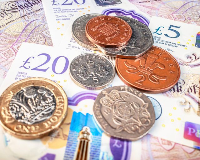 Various English coins and banknotes