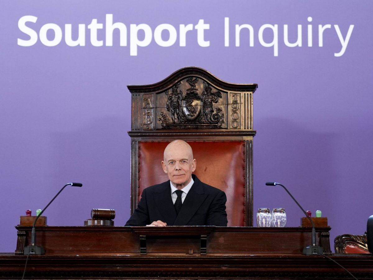 Chair Sir Adrian Fulford sitting inside the hearing room at Liverpool Town Hall, Liverpool, ahead of publication of the findings of the inquiry into the knife attack by Axel Rudakubana who murdered Alice da Silva Aguiar, nine, Bebe King, six, and Elsie Dot Stancombe, seven, at a Taylor Swift-themed dance class in Southport on July 29, 2024. Picture date: Sunday April 12, 2026. PA Photo. Photo credit should read: Peter Byrne/PA Wire