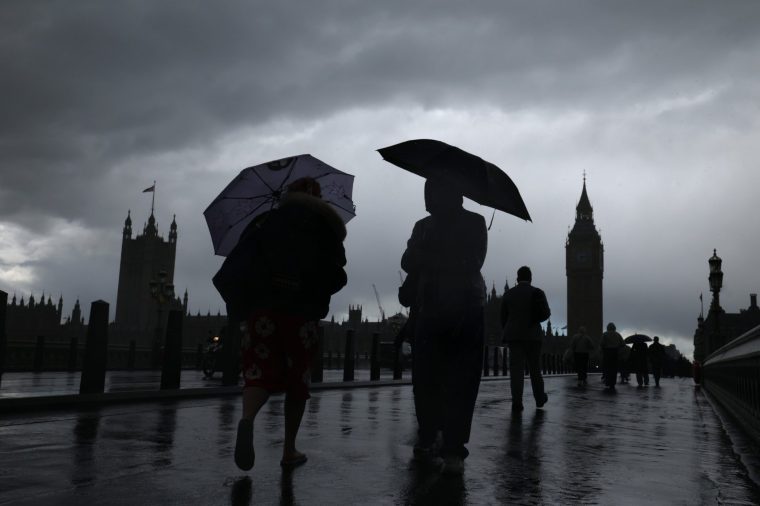 LONDON, ENGLAND - MAY 13: A view of the House of Commons during a rain storm following the State Opening of Parliament on May 13, 2026 in London, England. The State Opening of Parliament follows the prorogation of the previous session on 29 April. King Charles III will deliver the King's Speech outlining the government's legislative agenda for the 2026???27 session. Key priorities for the year include constitutional reforms regarding disgraced peers, a 10-year Health Plan for the NHS, and the implementation of changes to the Universal Credit two-child limit. (Photo by Dan Kitwood/Getty Images)