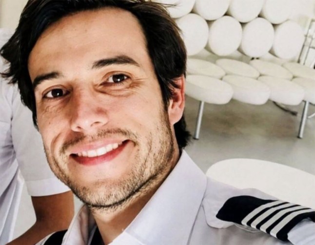 Story from Jam Press (Pilot Mysteriously Jumps) Pictured: The plane that was reportedly being flown by Leandro Andr?s Bertazzo. A 42-year-old pilot has mysteriously fallen to his death during a flight as a young trainee was forced to land the plane. Leandro Andr?s Bertazzo, 42, reportedly opened the door and jumped from the aircraft while in mid-air. The qualified commercial pilot was conducting a training flight with the 22-year-old woman when he allegedly jumped. The student pilot was forced to take control and land the Cessna C-150 light aircraft safely on her own. According to the student, named Rosario, Leandro told her ?you know what you have to do? and ?keep going forward?. The pilot, who worked for Flying Parrot Flight School in C?rdoba, Argentina, then removed his headphones, set aside his mobile phone, and unfastened his seatbelt. Rosario said he then opened the cabin door ? described as extremely difficult in flight due to air pressure ? and jumped from an altitude of about 820 feet (250 metres). The aircraft was flying near the rural area of Toledo, south of C?rdoba, when the incident occurred. The student immediately radioed for help, followed emergency procedures and landed the undamaged plane at the airfield without further incident. School director Eduardo ?lvarez, who received the alert from the student, said she was in shock but acted with ?great level-headedness?. She initially thought her instructor might have deployed a parachute but soon realised he had not. Eduardo and colleagues took off to search and located Leandro?s body in a field within 15 minutes. The emergency services confirmed his death at the scene. The instructor had flown earlier that day with another student on a re-training flight with no issues. Colleagues described him as cheerful, professional and impeccably presented, with no visible signs of distress. He had worked at the school for four years after a decade of training there and had previously flown in Chile, as reported by NeedToKnow. Eduardo, who called Leandro a friend, said: ?He arrived, we greeted each other with a kiss and a hug as always? We are all in shock. ?There is no way to understand what happened.? He added that Leandro had been applying for a position with a major airline. It later emerged that Leandro had reportedly received psychiatric treatment, a detail known only to his family. No colleagues had detected any warning signs during physical and mental health checks required every six months. The Federal Justice of C?rdoba is investigating the incident, which has stunned the local aviation community. Officials are examining all circumstances, although witness accounts point to a deliberate act. The student was unharmed and the aircraft sustained no damage, including to the door. ENDS EDITOR?S NOTES Fair Dealing / Fair Use: In limited cases, Jam Press may distribute material under fair dealing/fair use principles for legitimate editorial reporting purposes. Jam Press accepts responsibility for licensed editorial publisher usage only. Any additional client usage, including use across owned social media channels, commercial marketing or non-editorial purposes, remains the responsibility of the client.