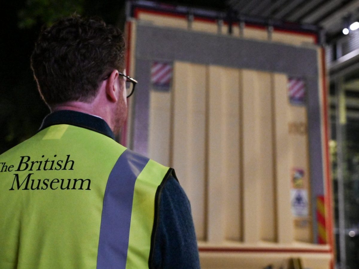 Nicholas Cullinan, director of the British Museum, waits for the truck (behind) carrying the Bayeux Tapestry to be unloaded at the museum in central London early on July 10, 2026, as the 11th-century artwork depicting the 1066 Norman conquest of England arrives ahead its first UK exhibition from September. The medieval Bayeux Tapestry arrived in London in the early hours of July 10, after a hugely complicated journey to leave France for the first time in more than 900 years for an exhibition in the British capital. (Photo by Richard A. Brooks / AFP via Getty Images)