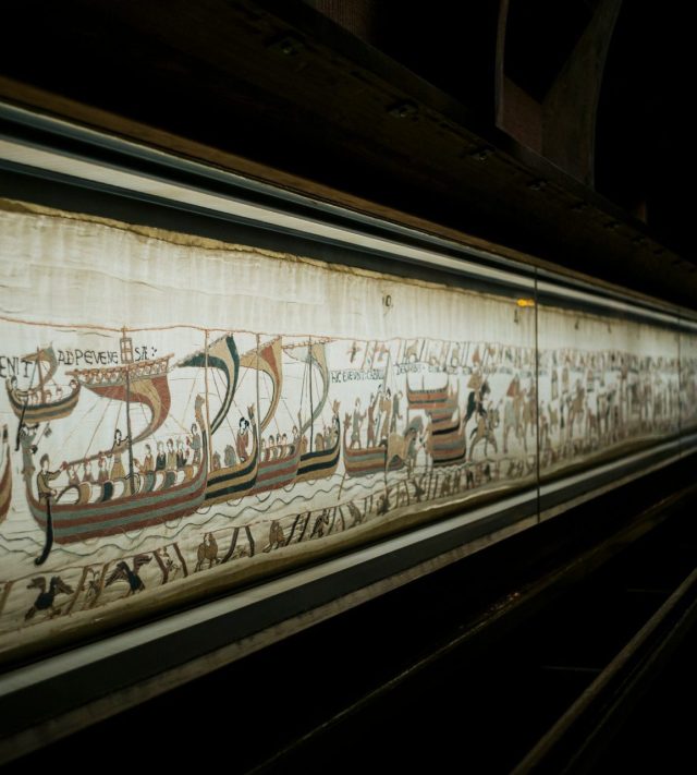 FILE - This photo taken Sept. 18, 2019 shows the 11th century Bayeux tapestry chronicling the Norman conquest of England, in Bayeux, Normandy, France. (AP Photo/Kamil Zihnioglu, File)