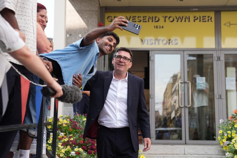 Newly confirmed Labour Party leader Andy Burnham has a selfie taken as he leaves after speaking with local stakeholders and party supporters about his plan to deliver good growth in every postcode across the country, during a visit to Gravesend Town Pier in Kent. The former Greater Manchester mayor, who returned to Westminster last month as Makerfield MP, will take over as prime minister and enter No 10 on Monday. Picture date: Friday July 17, 2026. PA Photo. Photo credit should read: Gareth Fuller/PA Wire ?