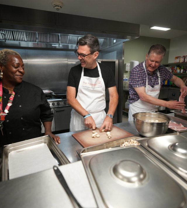 LONDON, ENGLAND - JULY 20: **embargoed until after Andy Burnham's Speech in Downing Street. Leader of the Labour Party Andy Burnham chops mushrooms as he helps prepare breakfast during a visit to The Passage Homeless Charity in Victoria on July 20, 2026 in London, England. Later today the Member of Parliament for Makerfield will become the UK's 59th Prime Minister, succeeding Sir Keir Starmer, who resigned as leader of the Labour Party and Prime Minister in June. (Photo by Christopher Furlong/Getty Images)