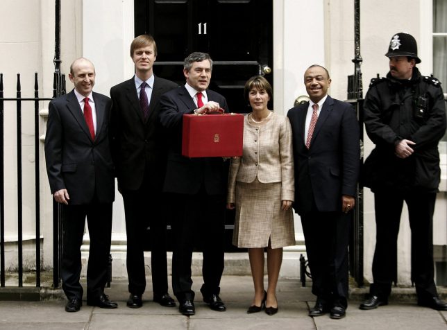 LONDON - MARCH 16: British Chancellor Gordon Brown (3L) and his treasury team (L-R) John Healey, Stephen Timms, Dawn Primarolo and Paul Boateng pose outside number 11 Downing Street on March 16, 2005 in London. The Chancellor presents his ninth annual budget to Parliament today.This is expected to be the last budget before Prime Minister Tony Blair calls a general election. (Photo by Peter Macdiarmid/Getty Images)