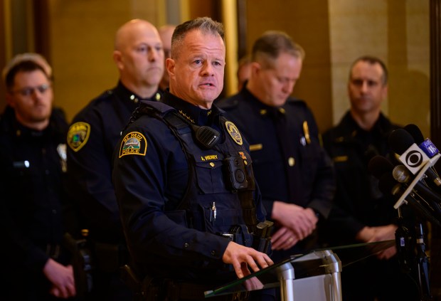 Axel Henry backed by other law enforcement leaders.