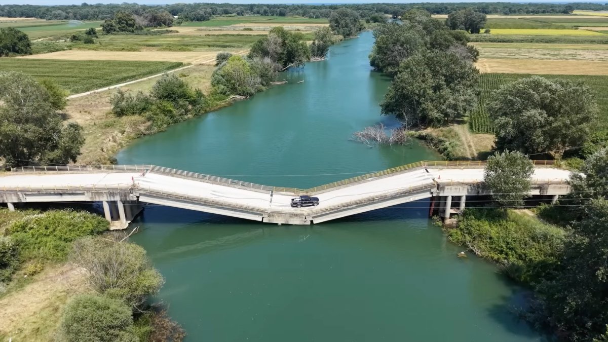Locals Keep Driving on This Buckled Bridge Because It's Quicker Than the Detour