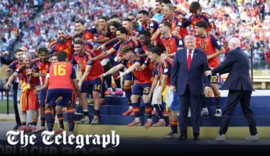 Donald Trump refuses to leave stage during World Cup trophy lift
