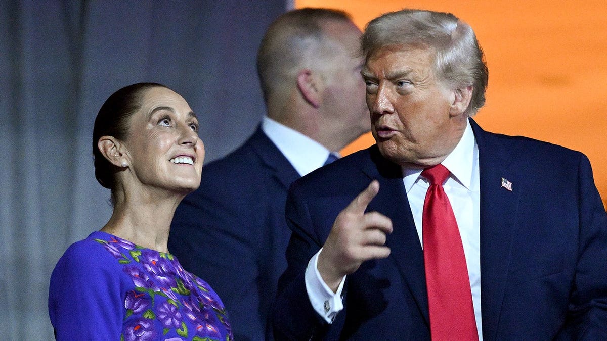 Sheinbaum looks up as Trump speaks