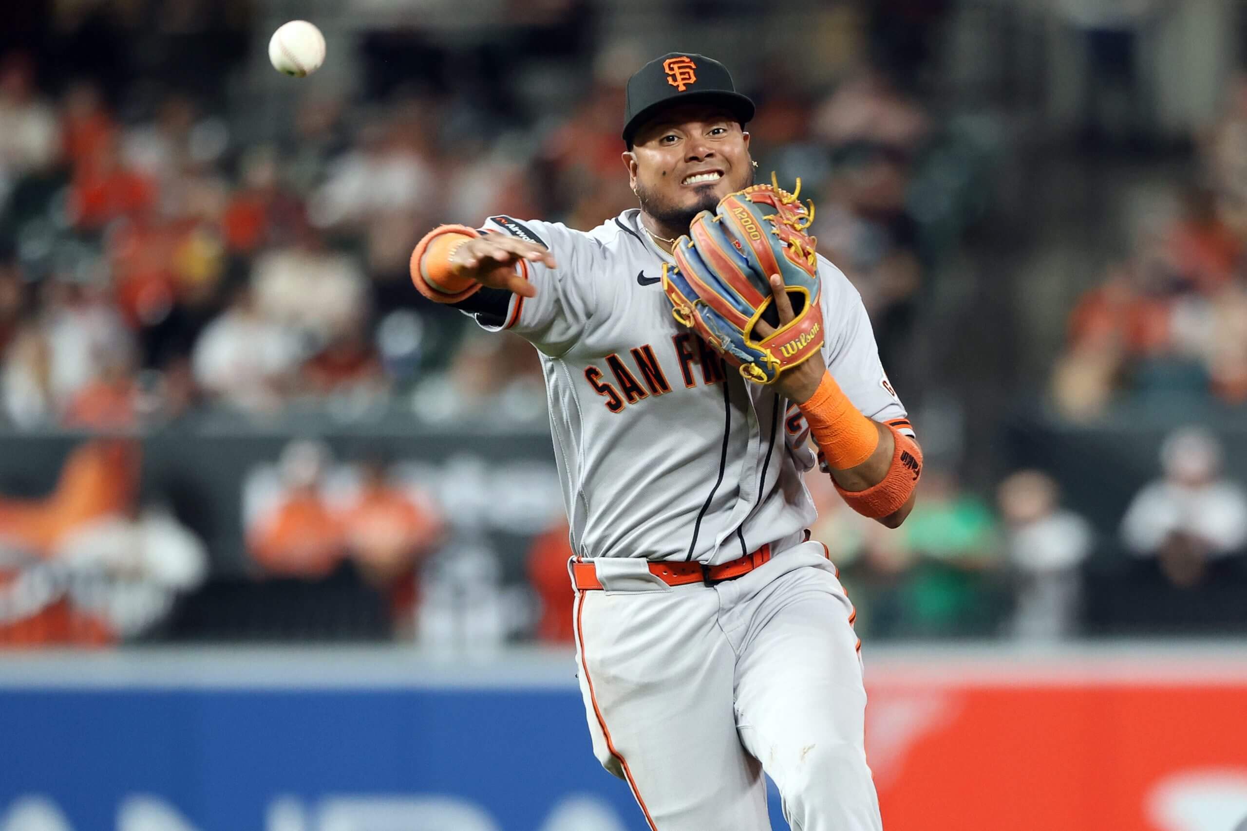 San Francisco Giants infielder Luis Arraez (1) throws to first base during the fourth inning against the Baltimore Orioles at Oriole Park at Camden Yards.
