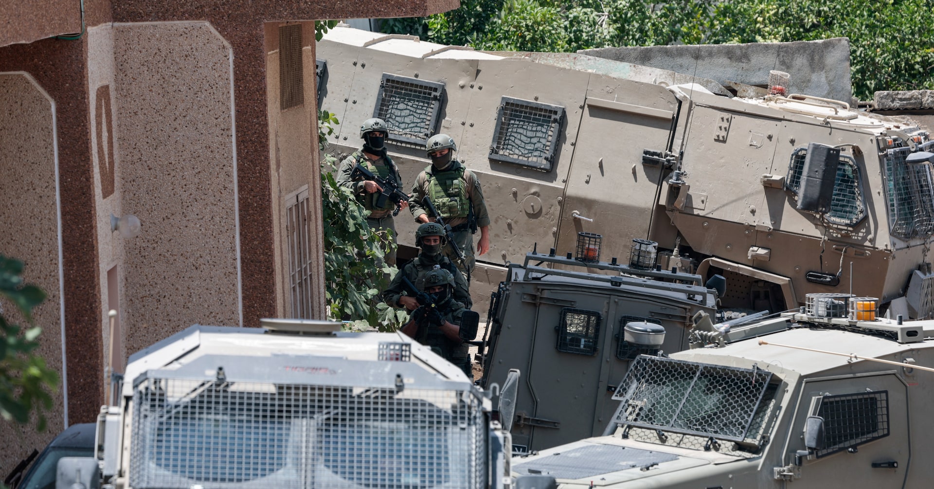 Israeli troops round up Palestinians in West Bank village after shootout involving settlers