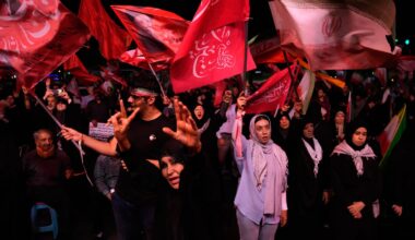 Iranian pro-government demonstrators chant slogans in a gathering at a square in Tehran, Iran, on July 28.