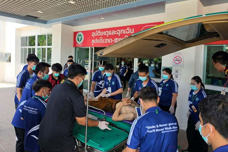 This handout photo taken and released on July 2, 2026 by Ruamjai Mukdahan Rescue Foundation shows an injured monk arriving at Mukdahan Hospital after a collision between a pickup truck driven by an 11-year old and a procession of Buddhist monks, killing eight monks and injuring more than 20 others, in the northeastern Thai province of Mukdahan. (Photo by handout / Ruamjai Mukdahan Rescue Foundation / AFP) / RESTRICTED TO EDITORIAL USE - MANDATORY CREDIT "AFP PHOTO / RUAMJAI MUKDAHAN RESCUE FOUNDATION - NO MARKETING NO ADVERTISING CAMPAIGNS - DISTRIBUTED AS A SERVICE TO CLIENTS - NO ARCHIVE