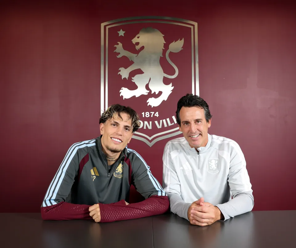 Unai Emery and Alejandro Garnacho pose after signing for Aston Villa