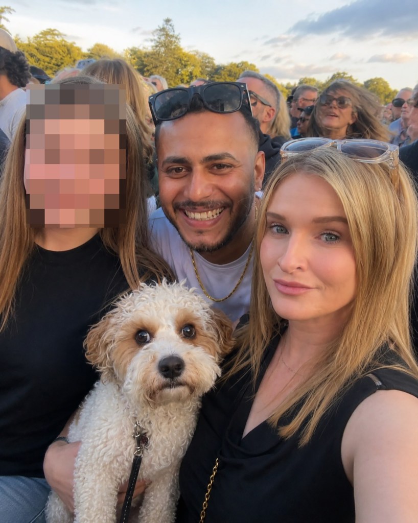 Jamey Carney (right) with Ahmad Alsaqer (center) and another woman (left) holding a small dog.