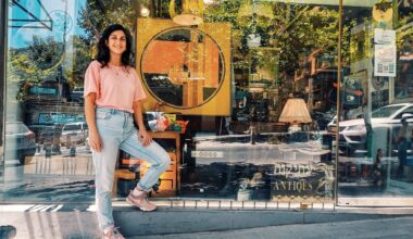 Batya 'Betty' Ezri stands in front of Batya Vintage House on Shlomzion HaMalka, 2026. (Gabi Nissan)