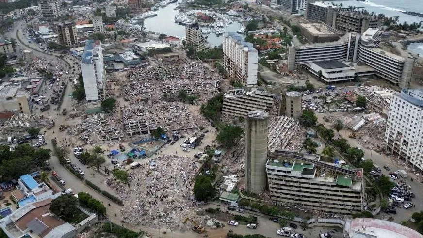 Destroyed buildings are seen in this aerial photo in Venezuela's northern coastal town of Caraballeda. Photo: 3 July 2026