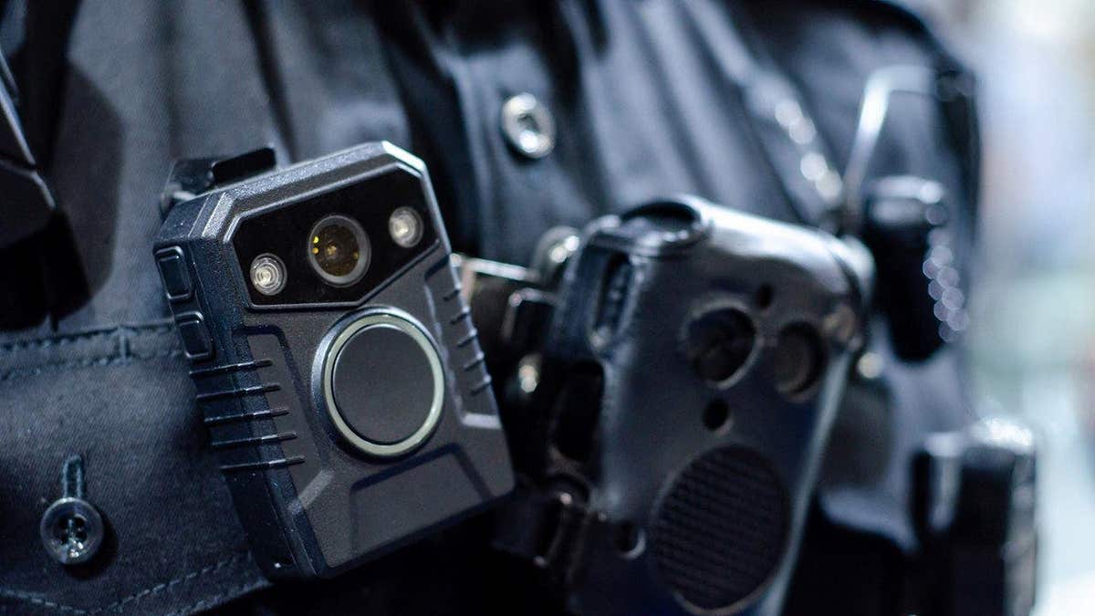 Close up body camera on police officer's chest