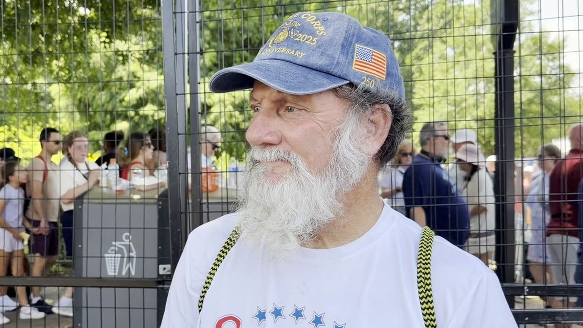 Marine veteran in ball cap attending the Great American State Fair.