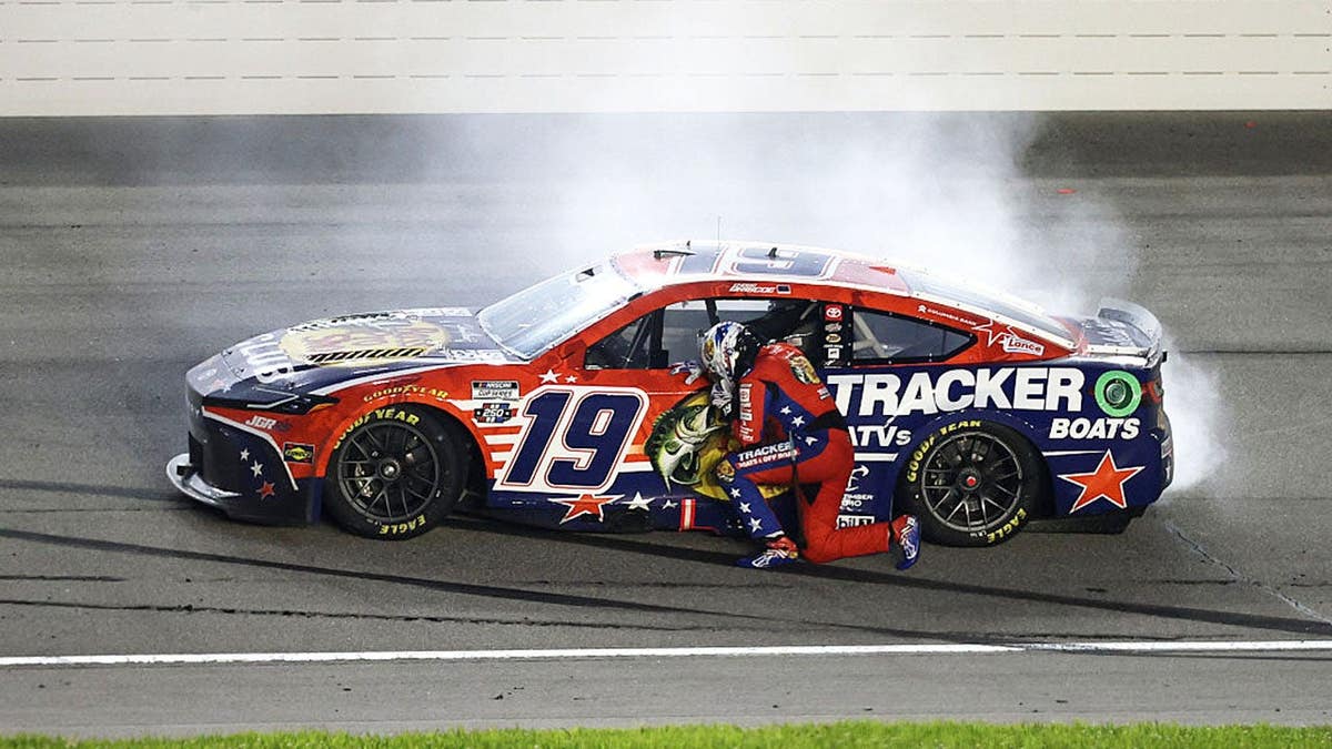 Chase Bricoe prays after NASCAR win.