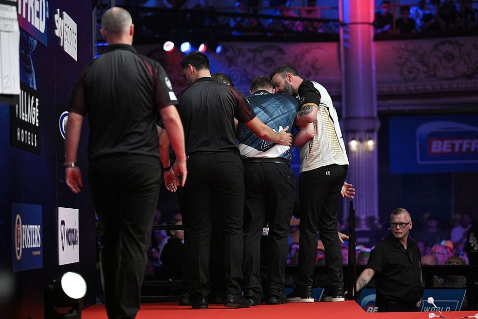 Cameron Menzies has been forced off stage after being taken ill