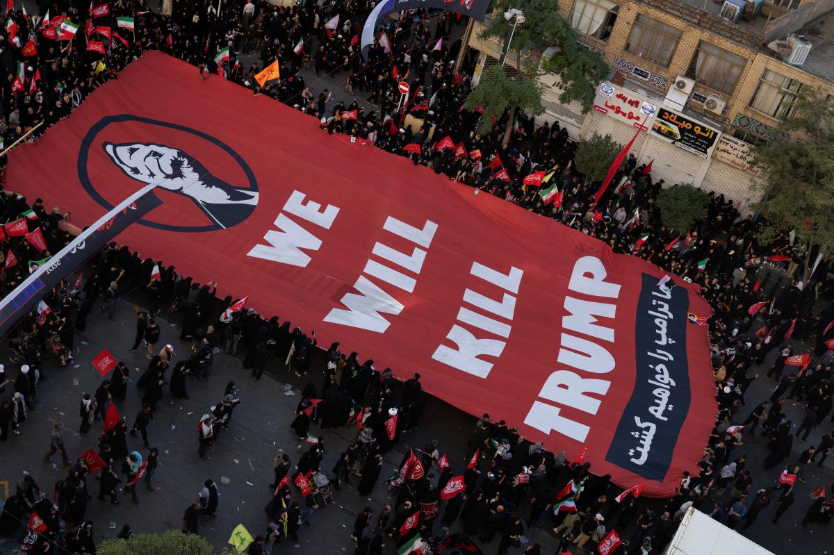 Iranians unfurl banner with Trump assassination threat at Ayatollah Khamenei's burial