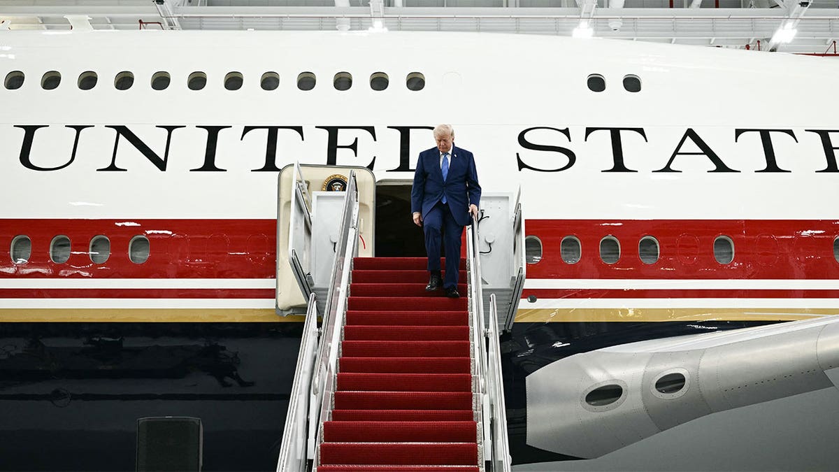 Donald Trump walking out of new Air Force One
