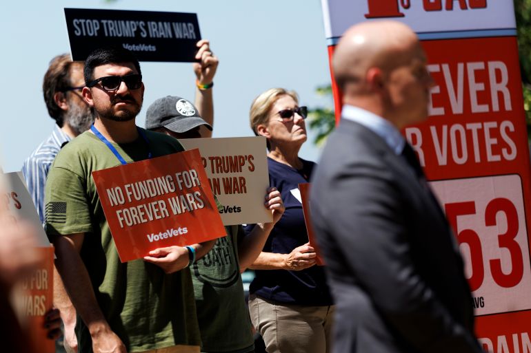 epa12978802 Protesters during a rally against the Iran conflict outside the US Capitol, Washington, DC, USA, 20 May 2026. The US Senate advanced a bill on 19 May that would force US President Donald Trump to either gain congressional approval or withdraw US troops. Senate Democrats argue the Iran war has caused an increase in gasoline prices across the United States. EPA/WILL OLIVER