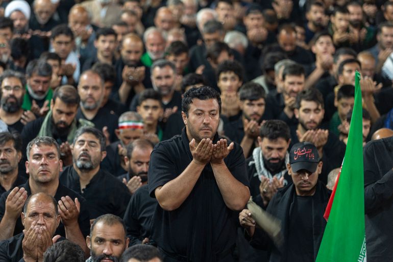 MASHHAD, IRAN - JULY 09: Thousands of mourners gather for the burial of Iran's late supreme leader, Ayatollah Ali Khamenei at the Imam Reza Shrine on July 09, 2026 in Mashhad, Iran. Khamenei and members of his family were killed on February 28 during U.S.-Israeli strikes at the beginning of the war, bringing an end to his 36-year rule over Iran. His body was laid to rest today in his hometown of Mashhad, Iran, following a six-day state funeral that began on July 4 and took place across multiple cities in Iran and Iraq. (Photo by Majid Saeedi/Getty Images)