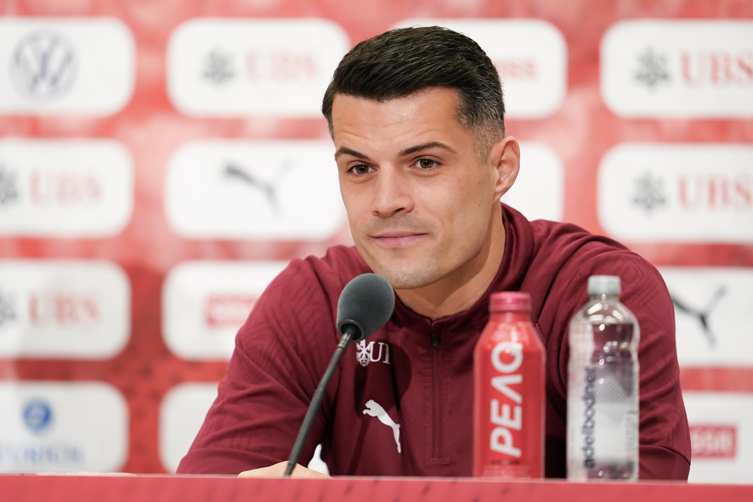 BASEL, SWITZERLAND - MARCH 26: Captain Granit Xhaka of Switzerland speaks during the Switzerland Press Conference at St. Jakob-Park on March 26, 2026 in Basel, Switzerland. (Photo by Daniela Porcelli/Getty Images)
