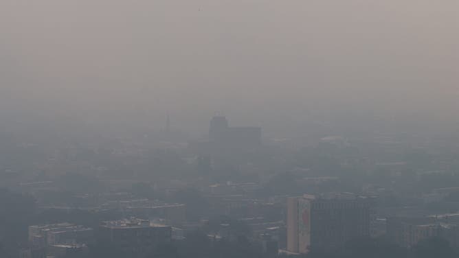 CHICAGO, ILLINOIS - JULY 16: An aerial shows smoke from Canadian wildfires blanketing the city on July 16, 2026 in Chicago, Illinois.