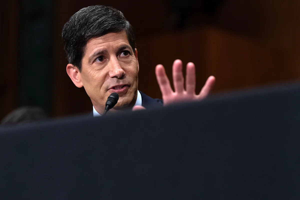 Fed holds interest rates steady, but 3 officials dissent in favor of a hike