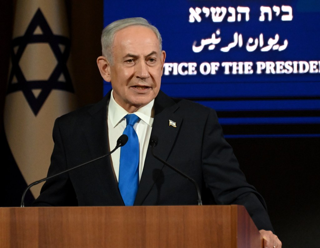 Israeli Prime Minister Benjamin Netanyahu speaks at a ceremony.