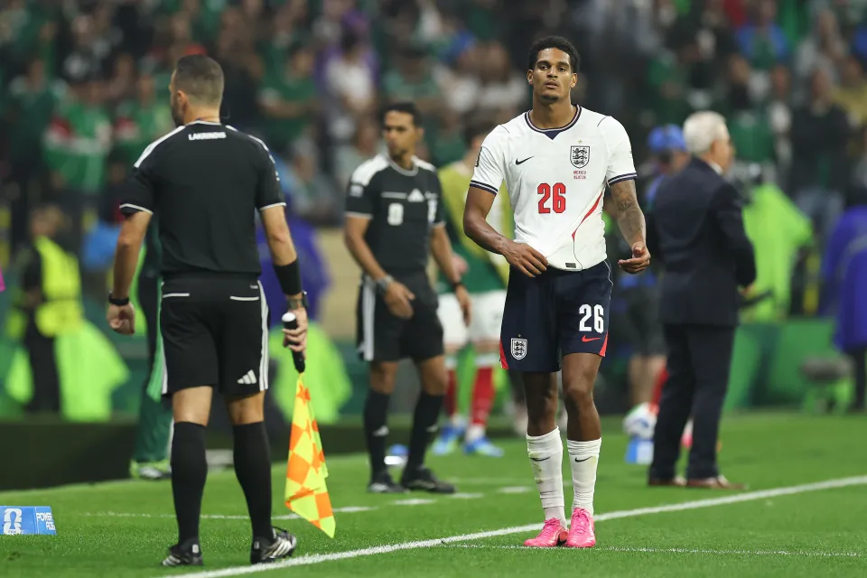 Jarell Quansah leaves the pitch after receiving a red card during England's win over Mexico
