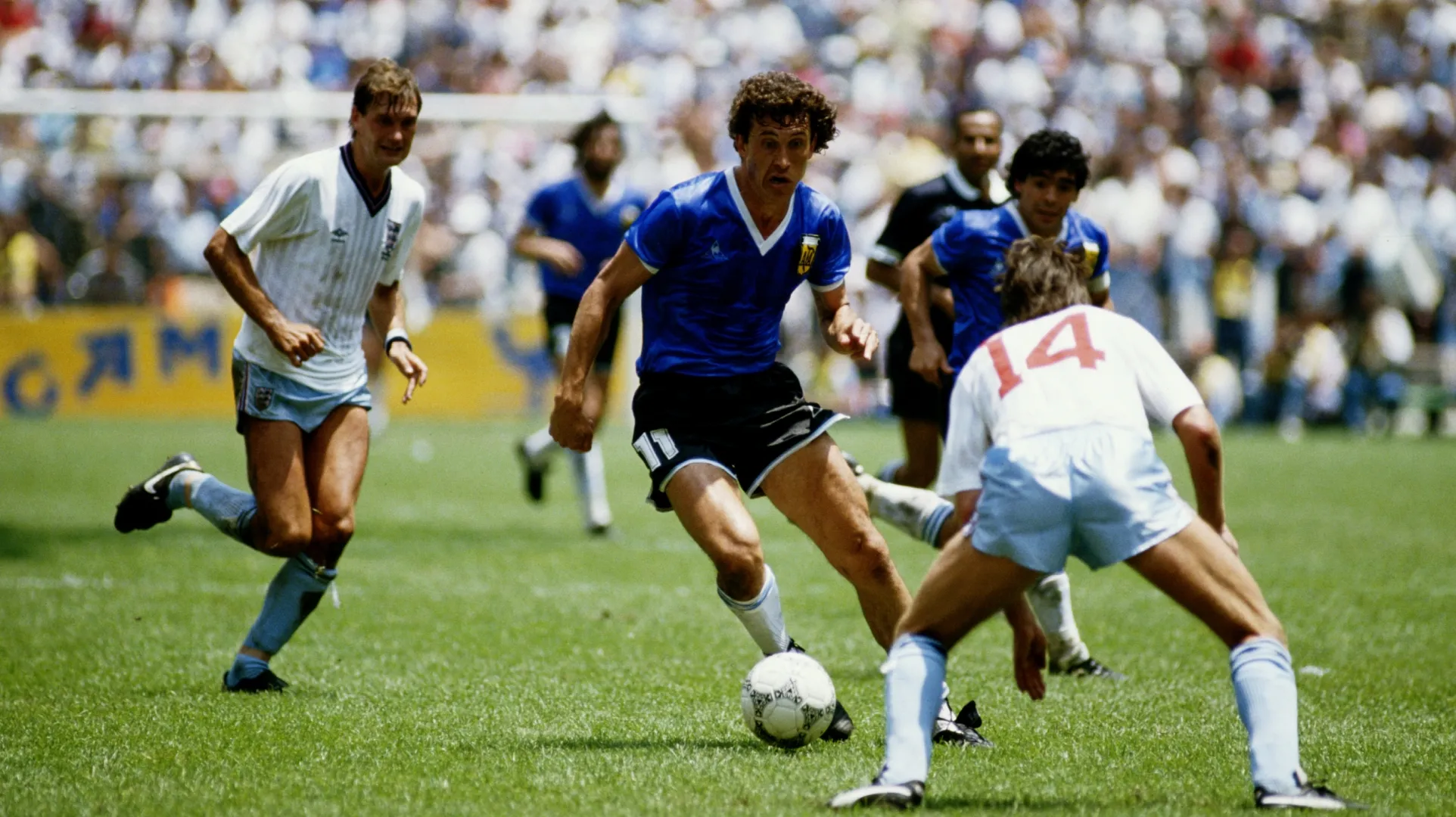 Jorge Valdano of Argentina attempts to pass Terry Fenwick of England in 1986 World Cup.