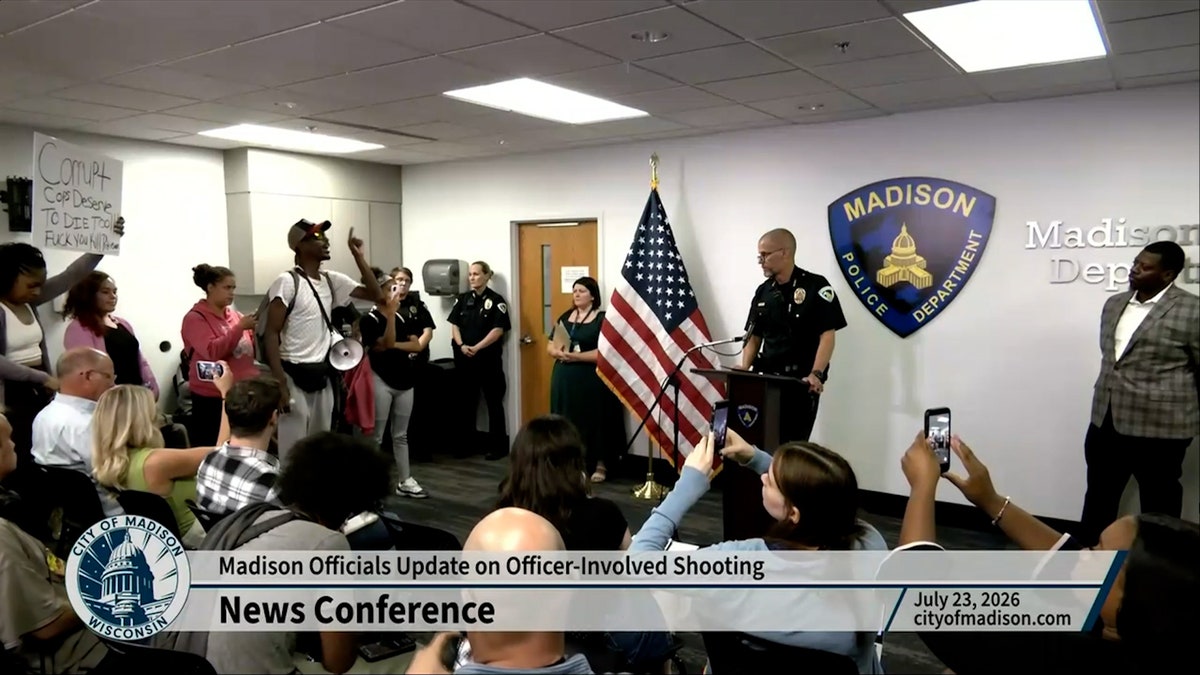 Protesters erupt at police briefing