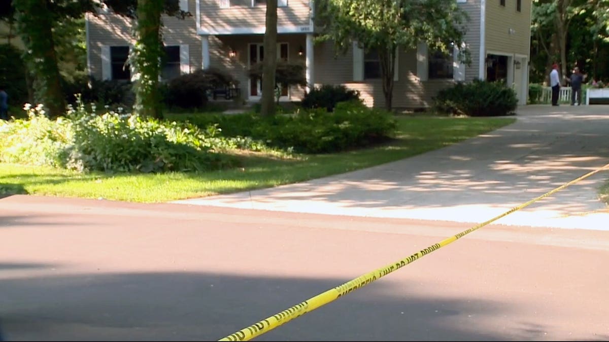 Authorities investigate a home in Grand Haven Township