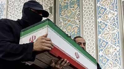 'Who was the masked man?' Khamenei funeral mystery solved